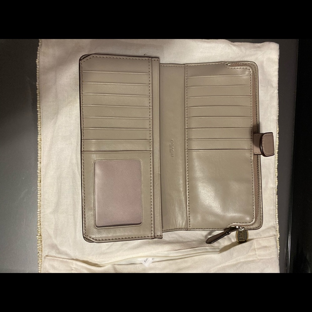 Coach wallet taupe with multiple storage areas